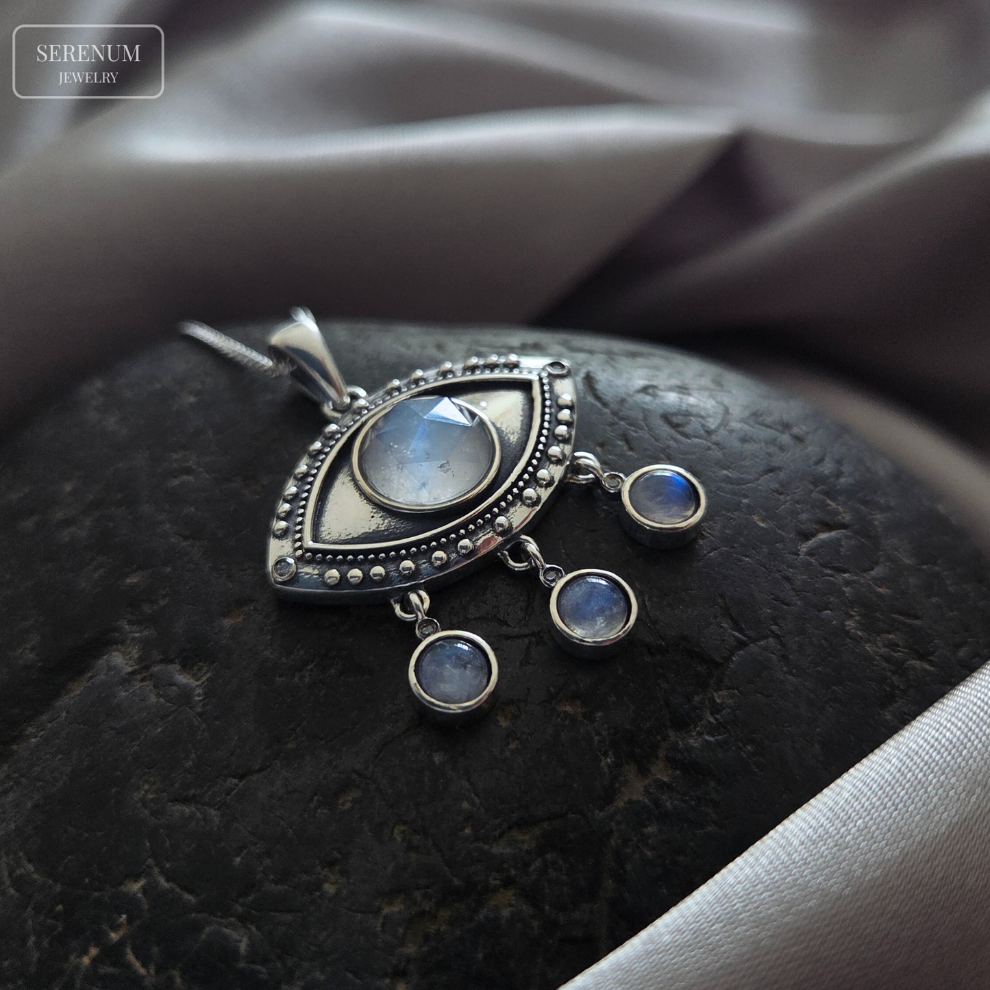 Silver Eye Necklace with Dangling Moonstones