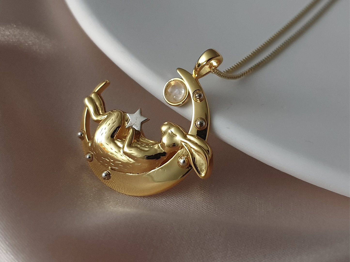 Gold Sleeping Bunny on Moon Necklace with Garnet
