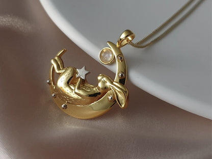 Gold Sleeping Bunny on Moon Necklace with Garnet