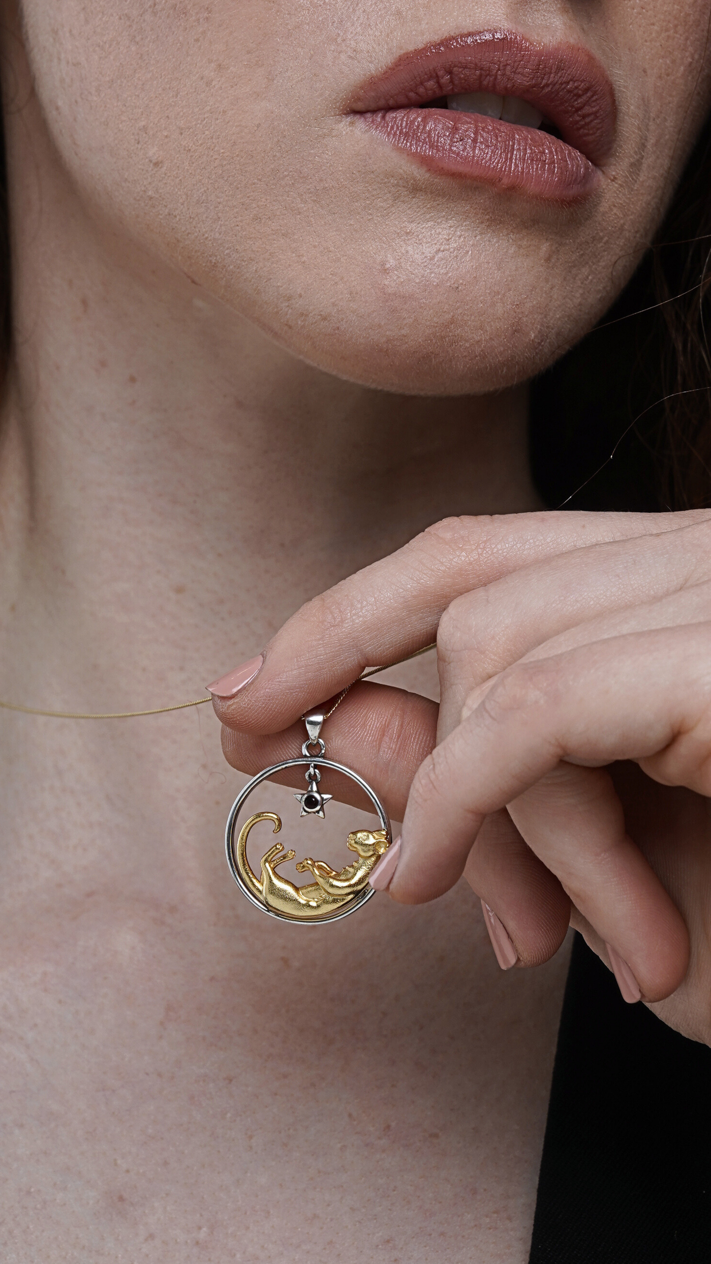 Silver and Gold Lioness Necklace with Garnet