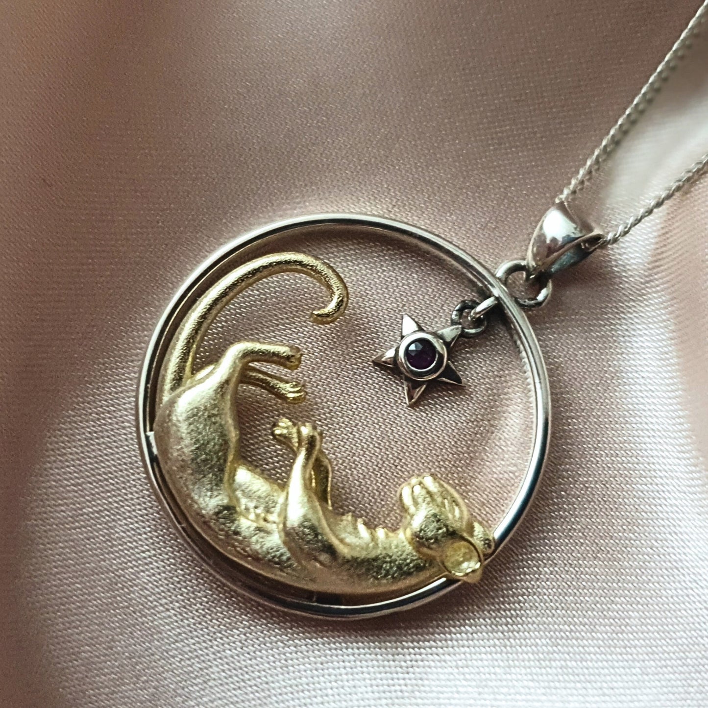 Silver and Gold Lioness Necklace with Garnet