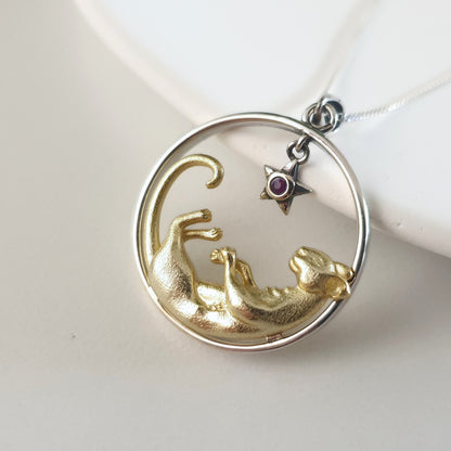 Silver and Gold Lioness Necklace with Garnet